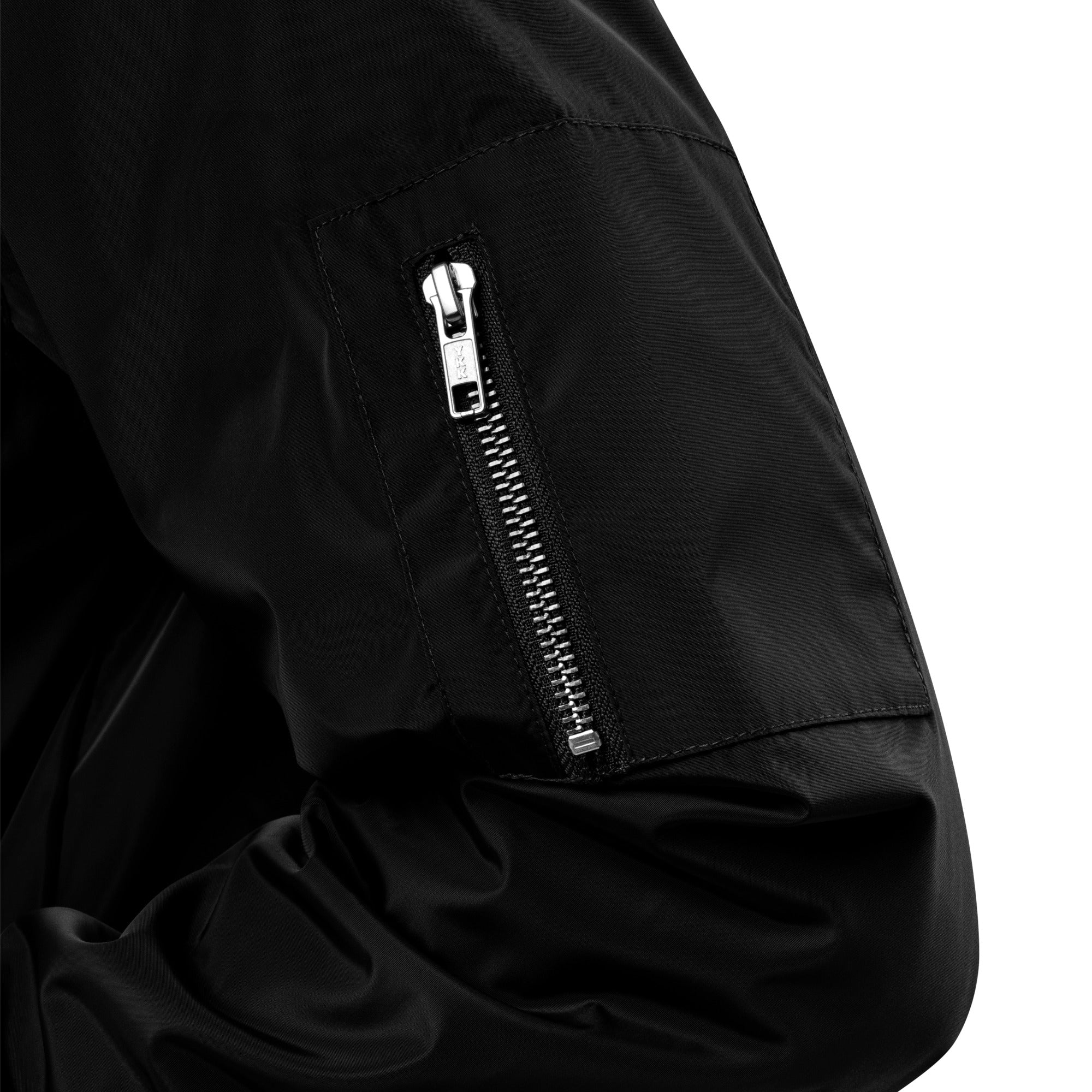 Close-up details of YKK zipper and rib-knit on Recycled Bomber Jacket